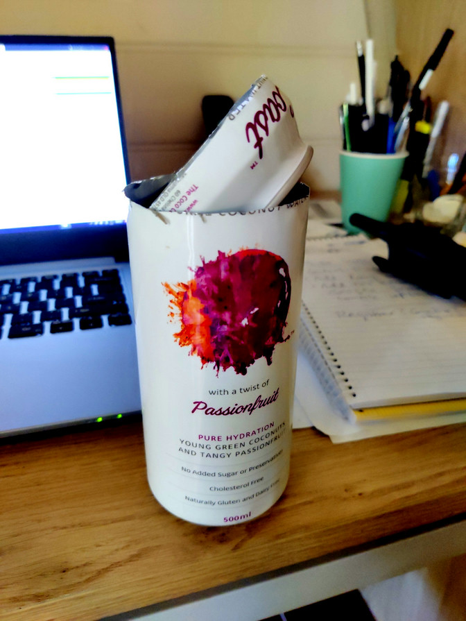 A coconut water can, with the top cut out